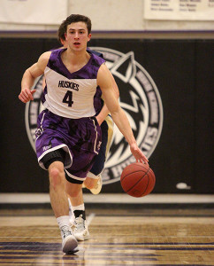 Boys basketball stomps the Saints