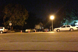 Police cars surround the house in the McConnell's neighborhood.