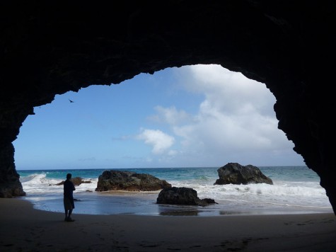 Arbucci stands in a sea cave located halfway through Kalalau Trail during his summer 2013 trip to Kauai (photo courtesy of Arbucci).
