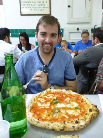 Arbucci poses in a pizzeria during his 2015 summer trip to Naples, Italy (photo courtesy of Arbucci).