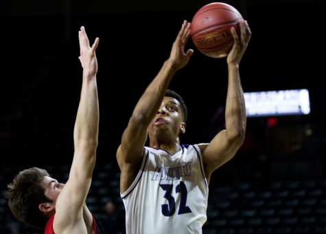 No. 1 Huskies win rematch, defeat No. 8 Lawrence 65-37 in state quarterfinals