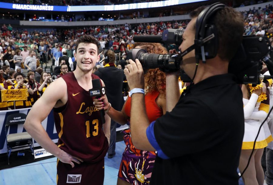 Custer+talks+to+Rosalyn+Gold-Anwude+of+TNT+after+his+game-winner+against+Tennessee+in+the+second+round.+%22It%E2%80%99s+fun+to+hit+a+game-winner+no+matter+what%2C%22+Custer+told+BVNWnews%2C+%22but+it+doesn%E2%80%99t+come+along+that+often.+In+high+school+a+lot+of+the+time+we+were+winning+by+too+much+to+ever+have+to+shoot+a+game-winner%2C+so+I+mean+I+don%E2%80%99t+think+I%E2%80%99ve+probably+made+more+than+four+or+five+game-winners+in+my+career.%22