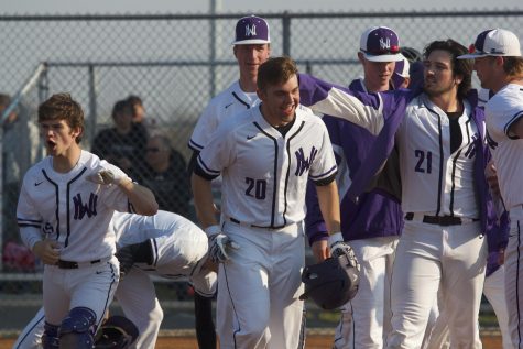 No. 2 Huskies outslug No. 1 Tigers, 15-10